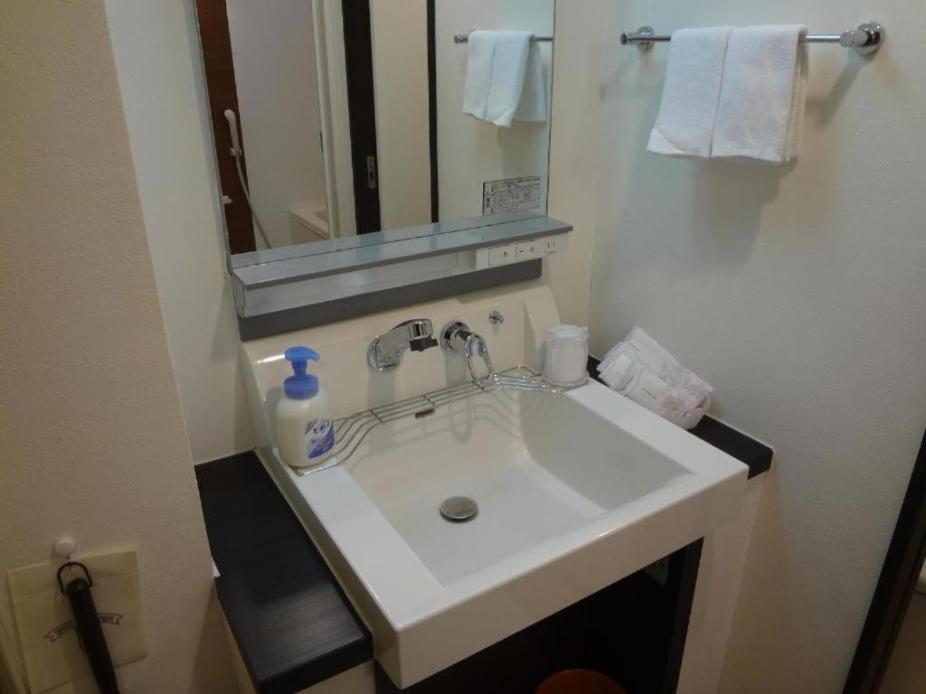 Hotel New Takada Tokyo prefektur Rum bild